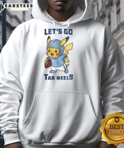 Premium North Carolina Tar Heels X Pikachu Let's Go Hoodie featuring vibrant graphics and a cozy design for fans.