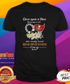 Alt Text: Premium t-shirt featuring 'Once Upon A Time There Was A Girl Who Loved Horses and Tampa Bay Buccaneers' design.