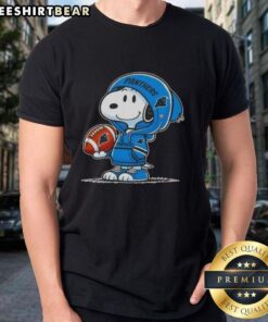 Alt Text: Premium Peanuts Snoopy in a Carolina Panthers hoodie, smiling at fans on a stylish t-shirt.