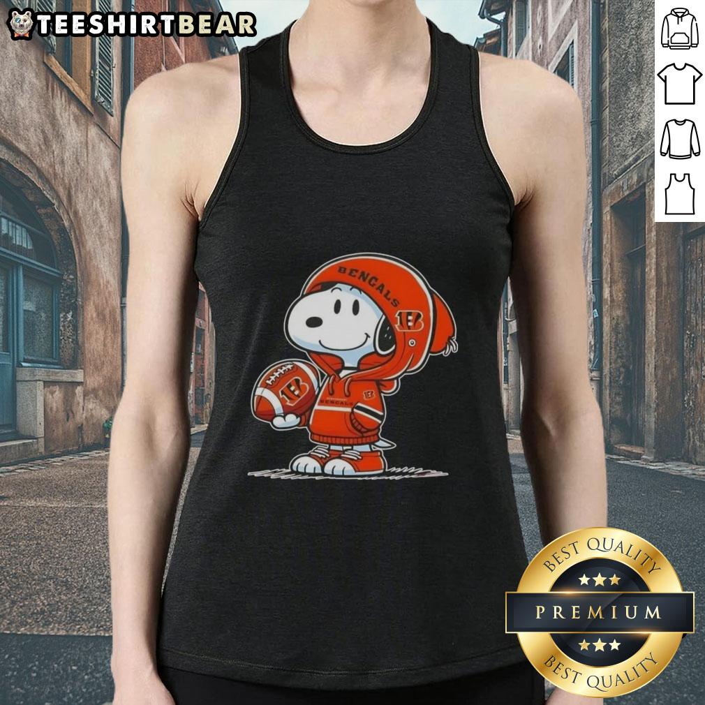 premium-peanuts-snoopy-wearing-hoodie-cincinnati-bengals-and-smilling-at-fans-tank-top Alt Text: Snoopy in a hoodie smiles at fans, featuring Premium Peanuts design and Cincinnati Bengals theme on a tank top.