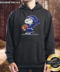 Alt Text: Premium Peanuts Snoopy wearing a Dallas Cowboys hoodie, smiling at fans in a cheerful, playful pose.