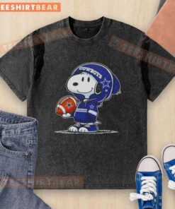 Alt Text: Premium Peanuts Snoopy wearing a Dallas Cowboys hoodie, smiling at fans on a washed t-shirt design.
