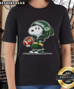 Snoopy in a hoodie smiles at fans, showcasing Premium Peanuts Green Bay Packers ladies' tee design.