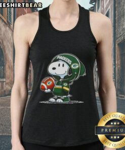 Alt Text: Snoopy in a Green Bay Packers hoodie, smiling at fans while wearing a tank top, showcasing premium peanuts design.