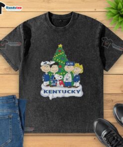 Alt Text: Premium Snoopy and Fiends Kentucky Wildcats Christmas washed t-shirt featuring festive graphics and vibrant colors.