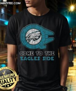 Premium Star Wars Philadelphia Eagles t-shirt featuring iconic characters and team logo, perfect for fans and collectors.