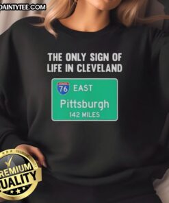 Premium sweatshirt featuring 'The Only Sign of Life in Cleveland' design, perfect for East Pittsburgh fans, 142 miles away.
