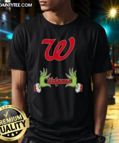 Premium Walgreens X Grinch Hands Merry Christmas T-Shirt featuring festive design with Grinch hands and holiday colors.