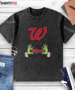 Premium Walgreens X Grinch Hands Merry Christmas washed t-shirt, featuring festive design perfect for holiday celebrations.