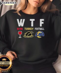 Premium wine-themed Los Angeles Rams Thanksgiving sweatshirt featuring festive design for football fans.
