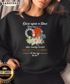 Alt Text: Cozy sweatshirt featuring the phrase Once Upon A Time There Was A Girl Who Loved Horses And Cleveland Browns.