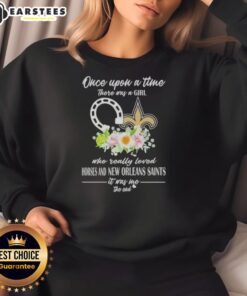 Alt Text: Pretty sweatshirt featuring 'Once Upon A Time There Was A Girl Who Loved Horses and New Orleans Saints' design.