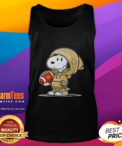 Snoopy in a hoodie smiles at fans while wearing a New Orleans Saints tank top, showcasing his love for football.