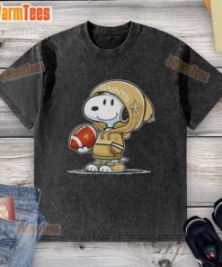 Alt Text: Snoopy in a hoodie, smiling at fans while wearing a New Orleans Saints washed t-shirt, showcasing pretty peanuts style.