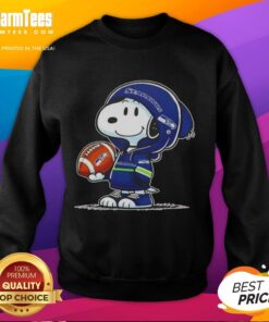 Snoopy wearing a Seattle Seahawks hoodie, smiling at fans, featured on a Pretty Peanuts sweatshirt.