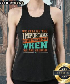 Woman wearing 'Pretty We Realize The Importance Of Our Voices Only When We Are Silenced' tank top, promoting empowerment.