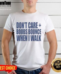 Alt Text: Woman wearing a 'Nice Don'T Care Boobs Bounce When I Walk' t-shirt, showcasing a fun and playful graphic design.