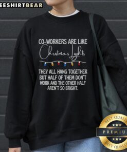 Cozy sweatshirt with 'Top Co-Workers Are Like Christmas Lights' design, perfect for holiday teamwork spirit.