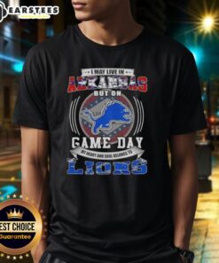Top I May Live In Arkansas But On Game Day Detroit Lions Football T-Shirt showcasing team spirit and pride.
