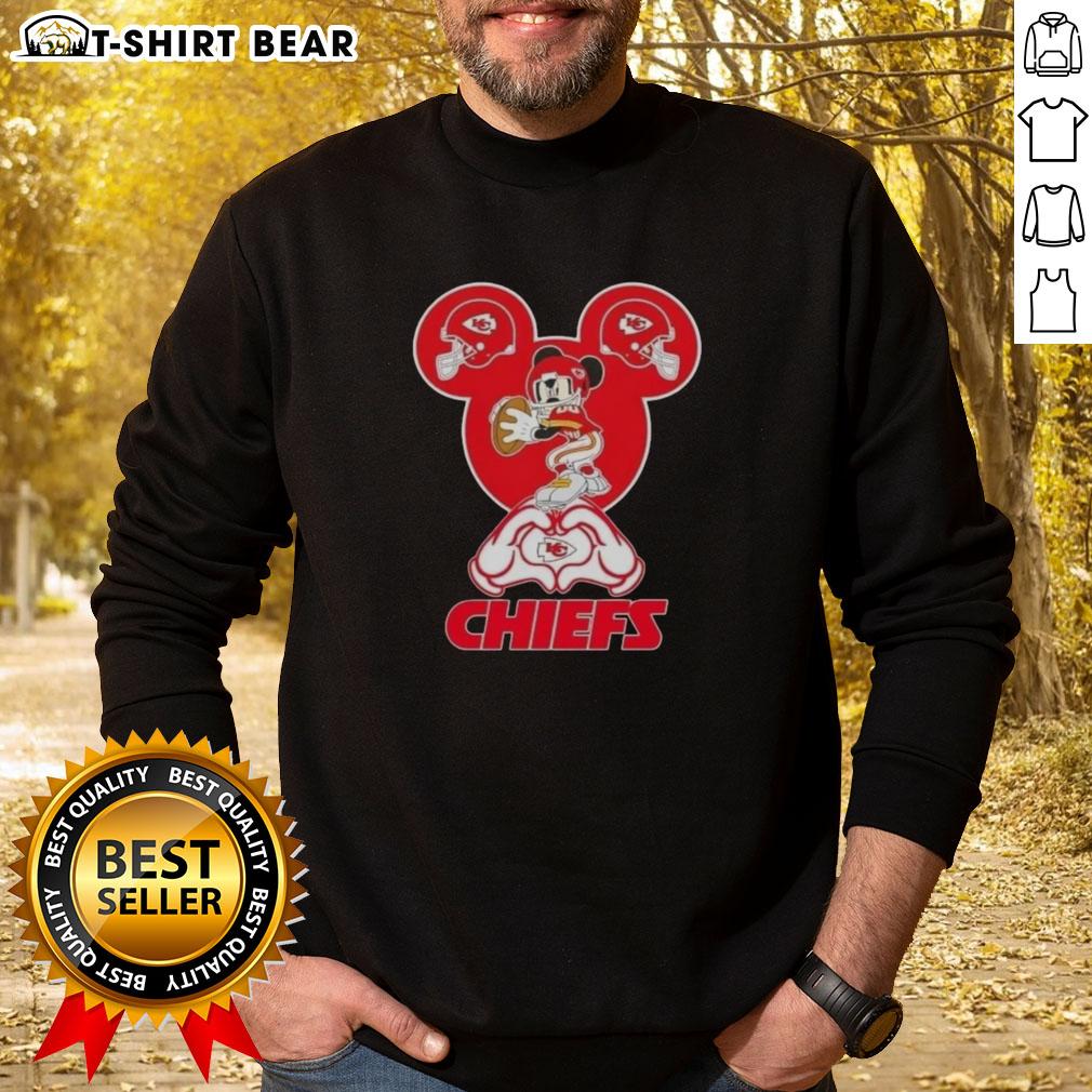 Top Mickey Hands Heart Kansas City Chiefs Football Sweatshirt Alt Text: Top Mickey hands heart design on Kansas City Chiefs football sweatshirt, perfect for fans and cozy game days.