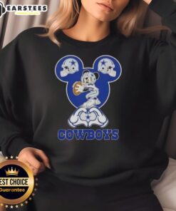 Top Mickey hands forming a heart on a Dallas Cowboys football sweatshirt, perfect for fans and stylish game day attire.