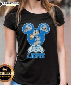 Top Mickey hands forming a heart on a Detroit Lions football ladies' tee, perfect for fans showing love.