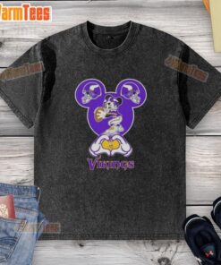 Top Mickey hands forming a heart on a Minnesota Vikings football washed t-shirt, perfect for fans and casual wear.