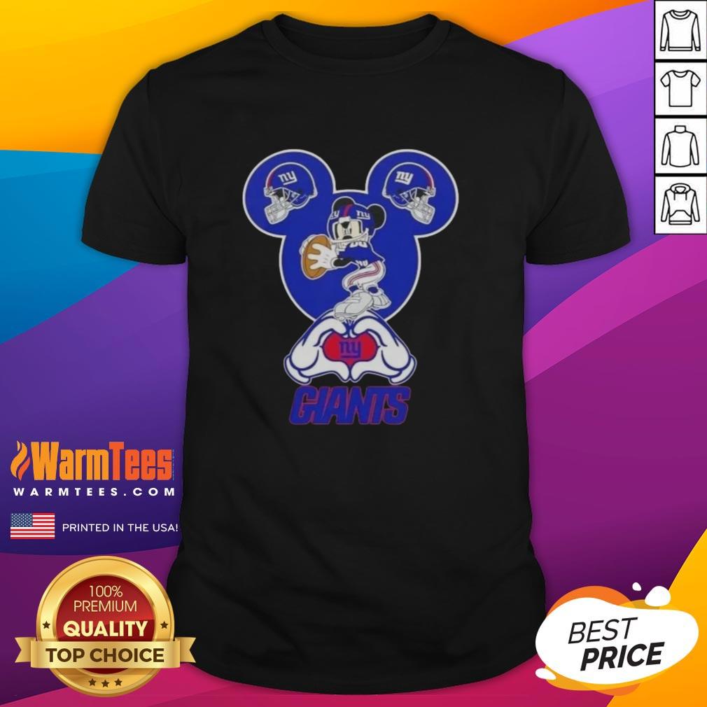 top-mickey-hands-heart-love-new-york-giants-football-t-shirt-1 Top Mickey Hands Heart Love New York Giants Football T-Shirt design featuring a playful Mickey Mouse graphic.