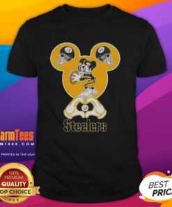 Top Mickey hands forming a heart on a Pittsburgh Steelers football T-shirt, perfect for fans and game day attire.