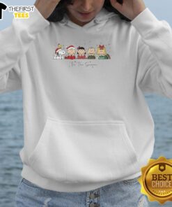 Alt Text: Cozy 'Tis The Season' Christmas hoodie featuring Snoopy and friends from Peanuts, perfect for holiday festivities.
