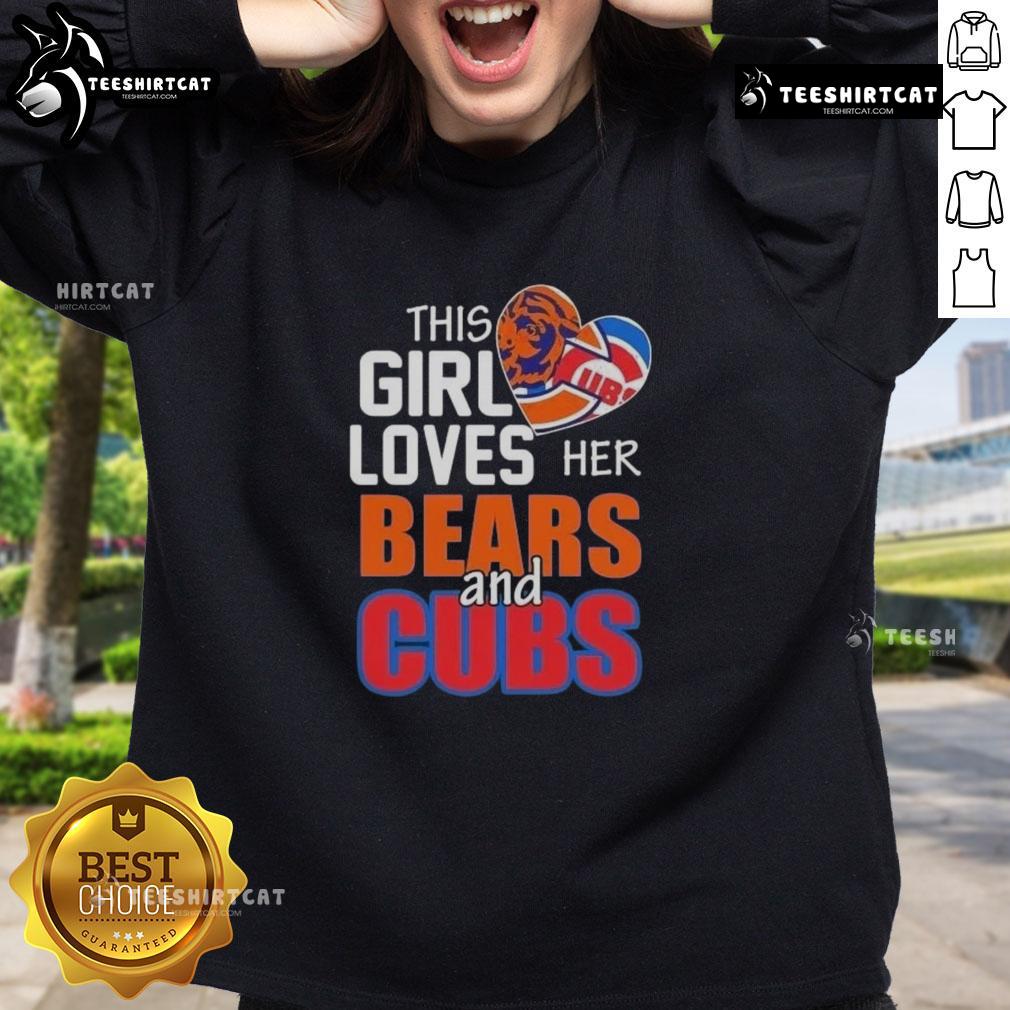 top-this-girl-loves-her-chicago-sports-bears-and-cubs-sweatshirt Girl in a Chicago sports sweatshirt, showcasing her love for the Bears and Cubs, smiling in a vibrant city setting.