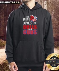 Alt Text: Girl wearing a Chicago Bulls and Cubs hoodie, showcasing her love for Chicago sports in a vibrant urban setting.