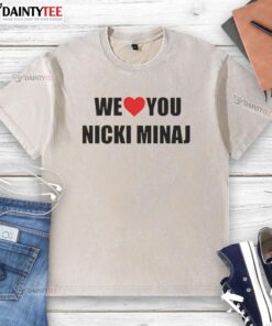 Alt Text: Top We Love You Nicki Minaj washed t-shirt featuring vibrant graphics and a comfortable fit for fans.
