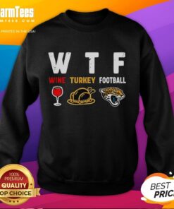 Cozy Top Wine Jacksonville Jaguars Thanksgiving sweatshirt featuring team logo, perfect for football fans celebrating the holiday.