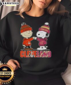 Alt Text: Awesome Charlie Brown and Snoopy Cleveland City Sports sweatshirt featuring Browns and Cavaliers logos.