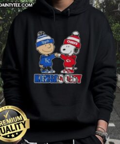 Awesome Charlie Brown fist bump with Snoopy in a Kansas City sports hoodie for Royals and Chiefs fans.