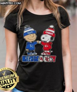 Awesome Charlie Brown and Snoopy fist bump in Kansas City sports tee for Royals and Chiefs fans, perfect for ladies.