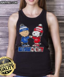 Awesome Charlie Brown fist bump with Snoopy, perfect tank top for Kansas City sports fans supporting Royals and Chiefs.