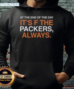 DJ Moore in 'F the Packers' hoodie, showcasing Chicago Bears pride at sunset, celebrating team spirit.