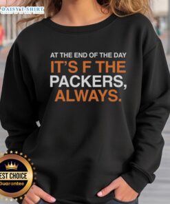 DJ Moore in a Chicago Bears sweatshirt, showcasing team pride with 'F the Packers' slogan at sunset.
