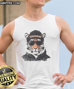 Cincinnati Bengals mascot in a beanie and sunglasses, wearing a tank top, showcasing team spirit and fun.