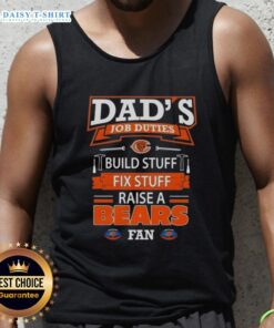 Awesome dad in a tank top showing Chicago Bears pride while building and fixing things around the house.