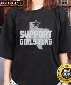 Three enthusiastic girls wearing Dallas Cowboys support tees, holding a flag, showcasing team spirit and pride.