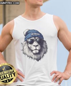 Alt Text: Awesome Detroit Lions mascot in a beanie and sunglasses wearing a tank top, showcasing team spirit and fun.
