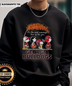 Georgia Bulldogs X Peanuts Snoopy sweatshirt celebrating autumn with a cozy design, perfect for fall festivities.