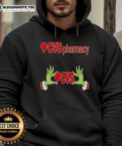 Awesome Grinch hands holding a heart, featuring a CVS Pharmacy Christmas hoodie design for festive holiday spirit.