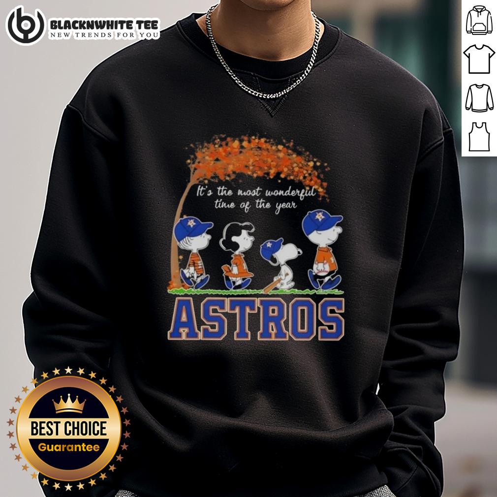Awesome Houston Astros X Peanuts Snoopy And Friends Autumn It's The Most Wonderful Time Of The Year Sweatshirt Alt Text: Cozy Houston Astros X Peanuts Snoopy and Friends sweatshirt celebrating autumn's most wonderful time of the year.