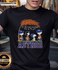 Alt Text: Houston Astros X Peanuts Snoopy autumn t-shirt featuring Snoopy and friends, perfect for celebrating the season.