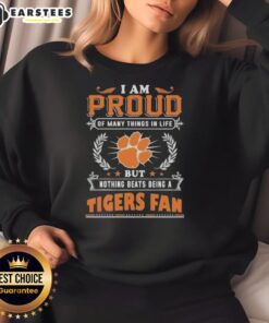 Alt Text: Clemson Tigers fan sweatshirt featuring 'I am proud of many things in life but nothing beats being a Clemson Tigers fan' design.