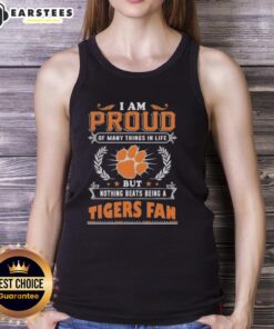 Clemson Tigers fan wearing a tank top that says 'I Am Proud Of Many Things, But Nothing Beats Being A Clemson Tigers Fan'.